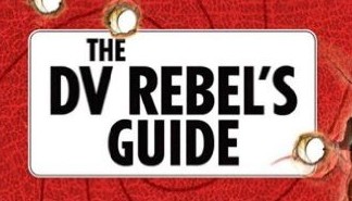 Close-up of a book cover titled "DV Rebel's Guide" with a metallic plate design and red background.
