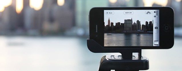 An iPhone 4 mounted on a Glif tripod capturing the skyline during twilight.