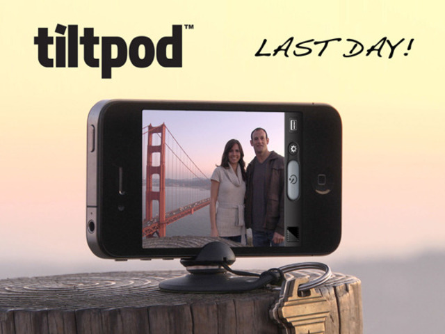 Compact Tiltpod mobile accessory attached to a smartphone displaying a couple's photo with the Golden Gate Bridge in the background, and text overlay "Kickstarter deal last day!".